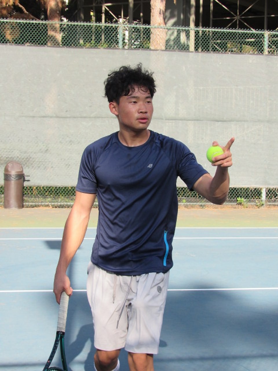 Isaac Lee calling out a drill during a lesson